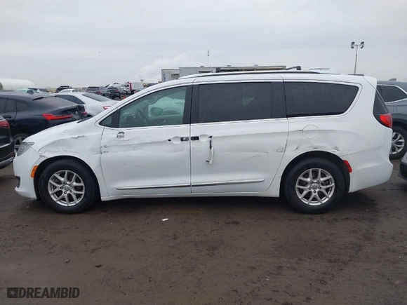 2020 Chrysler Pacifica Touring L with VIN 2C4RC1BG4LR143056, listed as a IAAI auction lot 41454617 with 104,171 mi miles. Bid and sale history available at carsss.com. Image 14.