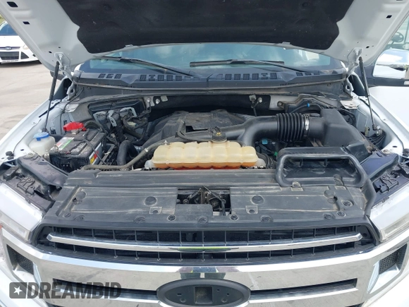 2018 Ford F-150 XL with VIN 1FTEW1EP0JFC32841, listed as a IAAI auction lot 42105784 with 119,764 mi miles. Bid and sale history available at carsss.com. Image 10.