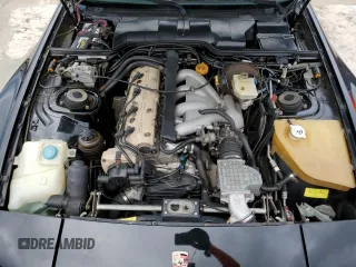 1990 Porsche 944 z VIN WP0CB2946LN480366, wystawiony jako Copart lot #74369454 z przebiegiem 78 709 mil mil oraz Szkoda całkowita • Salvage title. Historia ofert i sprzedaży dostępna na DreamBid. Obrazek 11.