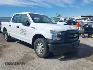 2015 Ford F-150 XL with VIN 1FTEW1CF5FKE60651, listed as a IAAI auction lot 41630778 with 150,815 mi miles. Bid and sale history available at carsss.com. Image 1.