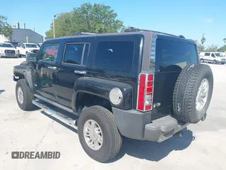 2007 Hummer H3 SUV with VIN 5GTDN13E878233953, listed as a IAAI auction lot 42012596 with 232,919 mi miles. Bid and sale history available at carsss.com. Image 3.
