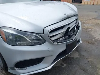 2014 Mercedes-Benz E with VIN WDDHF5KB8EB009303, listed as a IAAI auction lot 42014846 with 97,214 mi miles. Bid and sale history available at carsss.com. Image 18.