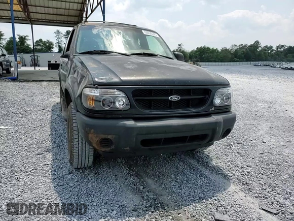 2000 Ford Explorer Sport with VIN 1FMYU60E8YUB03494, listed as a Copart auction lot 59266395 with 210,925 mi miles and Salvage title. Bid and sale history available at DreamBid. Image 14.