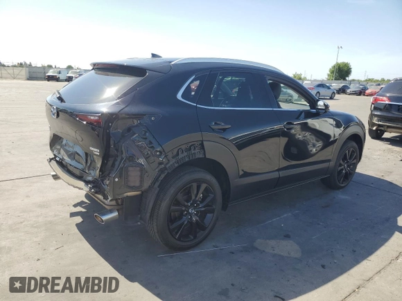 2023 Mazda CX-30 Premium Plus with VIN 3MVDMBEY0PM578346, listed as a Copart auction lot 58572345 with 14,027 mi miles and Salvage title. Bid and sale history available at DreamBid. Image 3.