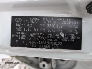 2002 Hyundai Accent GL with VIN KMHCG45C82U358523, listed as a Copart auction lot 48247575 with 164,869 mi miles and Salvage Title. Bid and sale history available at carsss.com. Image 13.