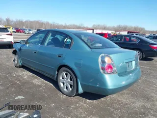 2002 Nissan Altima S with VIN 1N4AL11D92C152451, listed as a IAAI auction lot 41628699 with 143,184 mi miles. Bid and sale history available at carsss.com. Image 3.
