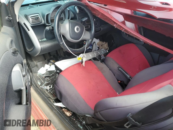 2009 Smart fortwo Pure with VIN WMEEJ31X79K249060, listed as a Copart auction lot 56927145 with Not provided miles and Salvage title. Bid and sale history available at DreamBid. Image 8.