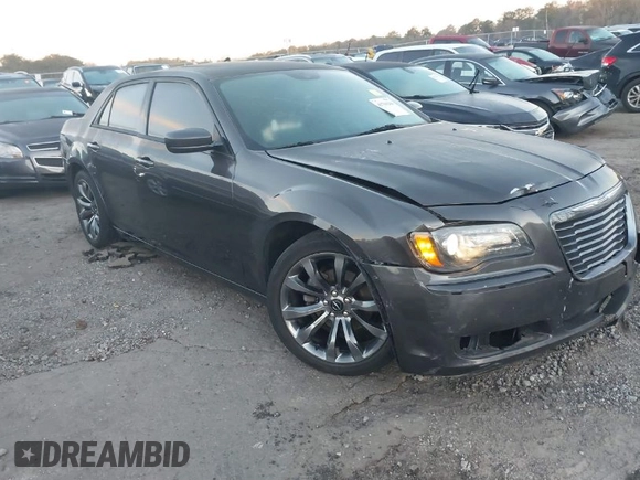 2014 Chrysler 300 S with VIN 2C3CCABG2EH352220, listed as a IAAI auction lot 41796284 with 127,070 mi miles and . Bid and sale history available at DreamBid. Image 1.