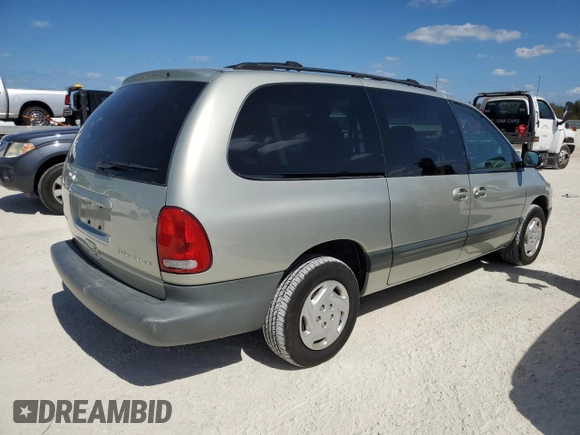 1999 Dodge Caravan SE with VIN 1B4GP44G5XB904043, listed as a Copart auction lot 77331804 with 105,141 mi miles and Clean Title. Bid and sale history available at DreamBid. Image 3.