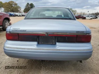 1997 Mercury Grand Marquis GS z VIN 2MELM74W2VX642879, wystawiony jako Copart lot #51464035 z przebiegiem 117 860 mil mil oraz Szkoda całkowita • Salvage title. Historia ofert i sprzedaży dostępna na DreamBid. Obrazek 6.