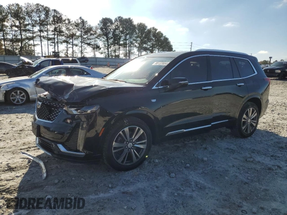 2021 Cadillac XT6 Premium Luxury z VIN 1GYKPDRS6MZ150397, wystawiony jako Copart lot #85137654 z przebiegiem 52 305 mil mil oraz Szkoda całkowita • Salvage title. Historia ofert i sprzedaży dostępna na DreamBid. Obrazek 1.