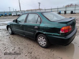2000 Honda Civic LX with VIN 2HGEJ6676YH512977, listed as a Copart auction lot 50985455 with 242,759 mi miles and Salvage Title. Bid and sale history available at DreamBid. Image 2.