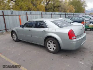 2005 Chrysler 300 with VIN 2C3JA53GX5H118300, listed as a IAAI auction lot 40872554 with NaN miles. Bid and sale history available at carsss.com. Image 3.