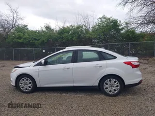 2012 Ford Focus SE with VIN 1FAHP3F21CL201889, listed as a IAAI auction lot 42070260 with 126,650 mi miles. Bid and sale history available at carsss.com. Image 14.