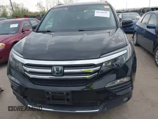 2017 Honda Pilot Touring with VIN 5FNYF6H93HB028122, listed as a IAAI auction lot 42130116 with 109,318 mi miles and . Bid and sale history available at DreamBid. Image 12.