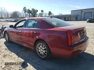 2009 Cadillac STS AWD z VIN 1G6DD67VX90138316, wystawiony jako Copart lot #80915524 z przebiegiem 112 290 mil mil oraz Czysty tytuł • Clean title. Historia ofert i sprzedaży dostępna na DreamBid. Obrazek 2.