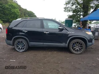 2012 Kia Sorento LX z VIN 5XYKTDA20CG218154, wystawiony jako IAAI lot #42428383 z przebiegiem 126 889 mil mil oraz . Historia ofert i sprzedaży dostępna na DreamBid. Obrazek 13.