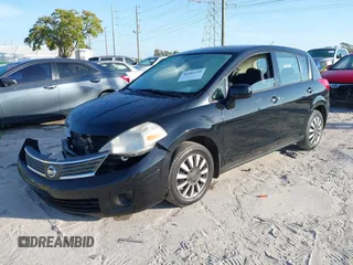 2009 Nissan Versa 1.8 SL with VIN 3N1BC13E79L476570, listed as a IAAI auction lot 41804750 with 160,449 mi miles. Bid and sale history available at carsss.com. Image 17.