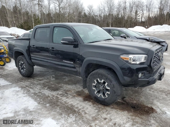 2023 Toyota Tacoma 4WD SR with VIN 3TYCZ5AN8PT128167, listed as a Copart auction lot 46230135 with 58,976 mi miles and Clean Title. Bid and sale history available at carsss.com. Image 4.