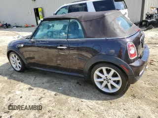 2013 MINI Convertible S with VIN WMWZP3C51DT551311, listed as a Copart auction lot 56083284 with Not provided miles and Salvage title. Bid and sale history available at DreamBid. Image 2.