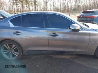 2019 Infiniti Q50 Luxe z VIN JN1EV7AR2KM590794, wystawiony jako IAAI lot #40841640 z przebiegiem 68 720 mil mil oraz . Historia ofert i sprzedaży dostępna na DreamBid. Obrazek 13.