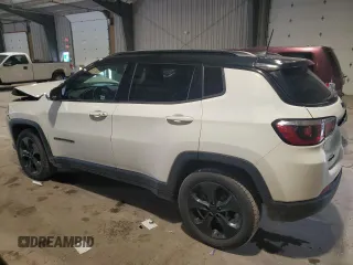 2020 Jeep Compass Latitude with VIN 3C4NJDBB1LT157875, listed as a Copart auction lot 60310155 with 81,817 mi miles and Salvage title. Bid and sale history available at DreamBid. Image 2.
