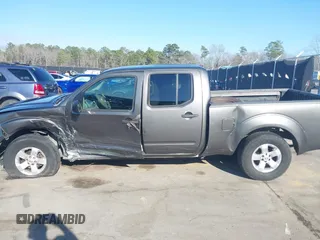 2009 Nissan Frontier LE with VIN 1N6AD09U79C402623, listed as a IAAI auction lot 41656385 with 286,777 mi miles and . Bid and sale history available at DreamBid. Image 14.
