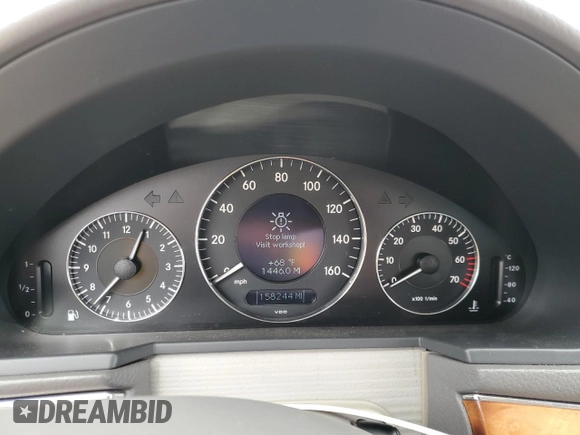 2003 Mercedes-Benz E-Class 5.0L with VIN WDBUF70J03A112909, listed as a Copart auction lot 49924865 with 158,244 mi miles and Salvage Title. Bid and sale history available at carsss.com. Image 9.