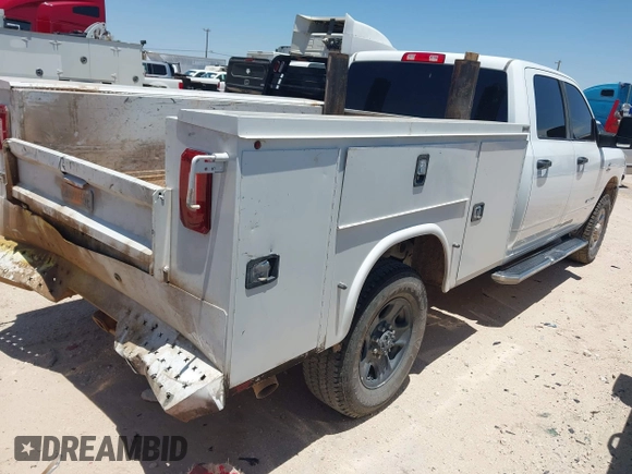 2023 Ram 2500 Big Horn with VIN 3C6UR5JL1PG651289, listed as a IAAI auction lot 42460464 with 65,567 mi miles and . Bid and sale history available at DreamBid. Image 4.