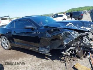 2015 Chevrolet Camaro LT z VIN 2G1FF1E34F9168703, wystawiony jako IAAI lot #42049357 z przebiegiem Nie podano mil oraz . Historia ofert i sprzedaży dostępna na DreamBid. Obrazek 14.