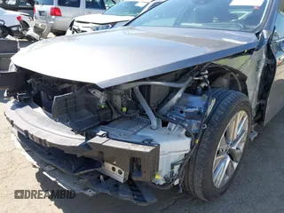 2021 Toyota Mirai XLE with VIN JTDAAAAAXMA002000, listed as a IAAI auction lot 42207752 with 33,017 mi miles and . Bid and sale history available at DreamBid. Image 6.