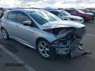 2014 Ford Focus ST with VIN 1FADP3L92EL349942, listed as a IAAI auction lot 41742097 with 141,540 mi miles and . Bid and sale history available at carsss.com. Image 1.