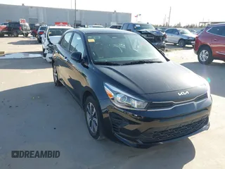 2022 Kia Rio S with VIN 3KPA25AD9NE443579, listed as a IAAI auction lot 41686106 with 28,412 mi miles and . Bid and sale history available at DreamBid. Image 1.