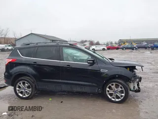 2013 Ford Escape SEL with VIN 1FMCU9H90DUA77972, listed as a IAAI auction lot 41984889 with 206,265 mi miles. Bid and sale history available at carsss.com. Image 13.