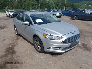 2017 Ford Fusion SE with VIN 3FA6P0T90HR243521, listed as a IAAI auction lot 42704179 with 104,657 mi miles and . Bid and sale history available at DreamBid. Image 1.