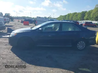 2014 Toyota Camry L with VIN 4T1BF1FK3EU820882, listed as a IAAI auction lot 42012278 with 174,000 mi miles and . Bid and sale history available at DreamBid. Image 15.