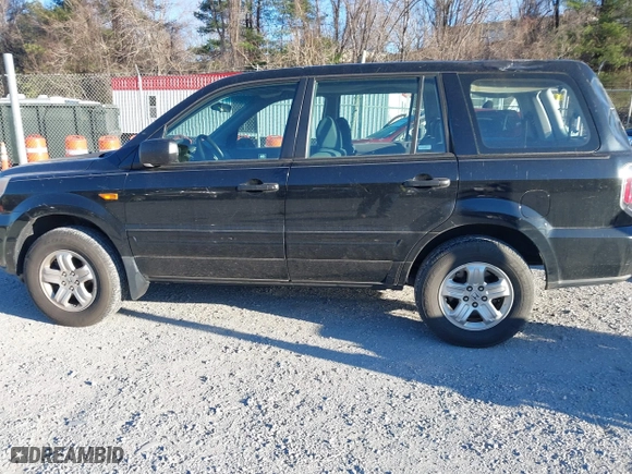 2007 Honda Pilot LX with VIN 5FNYF18177B017068, listed as a IAAI auction lot 41844268 with 164,145 mi miles. Bid and sale history available at carsss.com. Image 14.