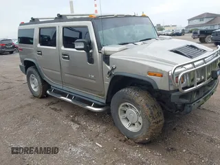 2004 Hummer H2 z VIN 5GRGN23U64H107487, wystawiony jako IAAI lot #42512523 z przebiegiem 101 586 mil mil oraz . Historia ofert i sprzedaży dostępna na DreamBid. Obrazek 1.