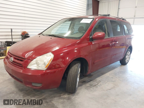 2010 Kia Sedona LX with VIN KNDMG4C35A6343380, listed as a IAAI auction lot 42042669 with 119,648 mi miles. Bid and sale history available at carsss.com. Image 2.
