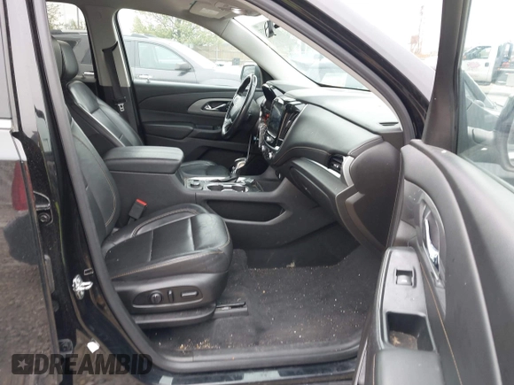 2021 Chevrolet Traverse LT with VIN 1GNERHKW0MJ218426, listed as a IAAI auction lot 42178273 with 76,545 mi miles and . Bid and sale history available at DreamBid. Image 5.