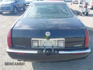 2002 Cadillac Eldorado ESC with VIN 1G6EL12YX2B105502, listed as a IAAI auction lot 42121952 with 110,261 mi miles. Bid and sale history available at carsss.com. Image 12.