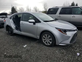 2023 Toyota Corolla LE with VIN JTDB4MEE9P3005828, listed as a Copart auction lot 47318595 with 15,593 mi miles and Salvage Title. Bid and sale history available at carsss.com. Image 4.