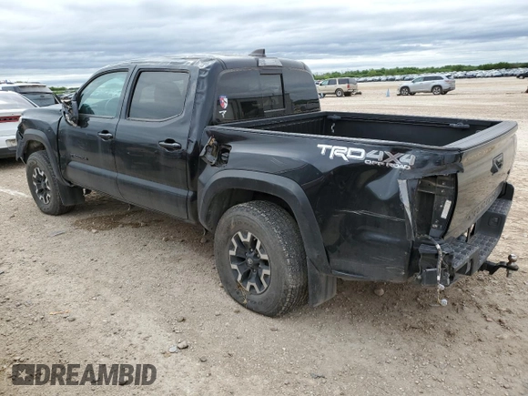 2021 Toyota Tacoma SR z VIN 5TFCZ5AN1MX256607, wystawiony jako Copart lot #52182225 z przebiegiem 44 717 mil mil oraz Szkoda całkowita • Salvage title. Historia ofert i sprzedaży dostępna na DreamBid. Obrazek 2.