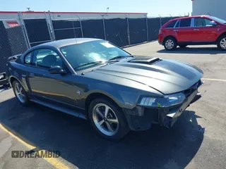 2004 Ford Mustang Premium Mach 1 with VIN 1FAFP42R14F170143, listed as a IAAI auction lot 42059333 with 141,778 mi miles and . Bid and sale history available at DreamBid. Image 1.