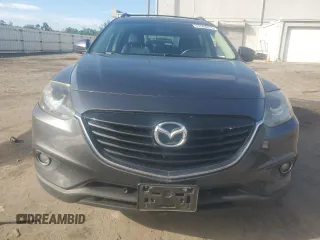 2015 Mazda CX-9 Touring z VIN JM3TB3CA2F0460970, wystawiony jako Copart lot #61544015 z przebiegiem 102 190 mil mil oraz Czysty tytuł • Clean title. Historia ofert i sprzedaży dostępna na DreamBid. Obrazek 5.