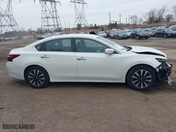 2018 Nissan Altima 2.5 SL with VIN 1N4AL3AP5JC199495, listed as a IAAI auction lot 41665962 with 136,814 mi miles. Bid and sale history available at carsss.com. Image 14.
