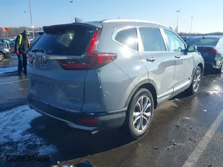 2021 Honda CR-V Touring with VIN 2HKRW2H97MH680203, listed as a IAAI auction lot 41357188 with 50,211 mi miles. Bid and sale history available at carsss.com. Image 4.