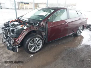 2018 Honda Clarity Plug-In Hybrid Touring with VIN JHMZC5F3XJC005797, listed as a IAAI auction lot 42021622 with 58,307 mi miles. Bid and sale history available at carsss.com. Image 2.