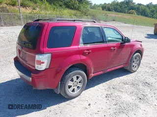 2011 Mercury Mariner with VIN 4M2CN8B77BKJ04817, listed as a IAAI auction lot 40493583 with 292,950 mi miles and . Bid and sale history available at DreamBid. Image 4.