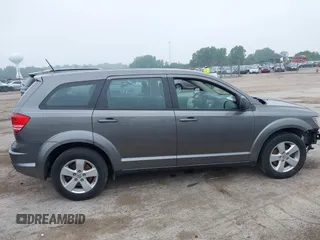 2013 Dodge Journey American Value with VIN 3C4PDCAB2DT645973, listed as a IAAI auction lot 42449402 with 133,000 mi miles and . Bid and sale history available at DreamBid. Image 14.